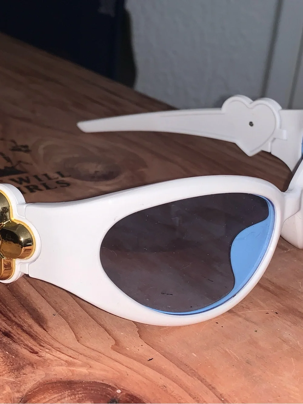 White Oval Sunglasses with Light Blue Lenses